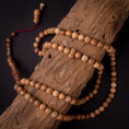 Load image into Gallery viewer, Rosary Of Natural Ebony Wood 99 Beads
